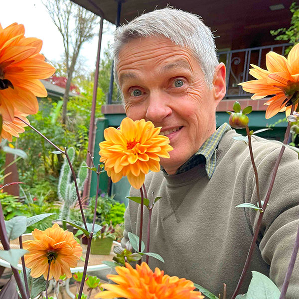 Daniel Sparler with dahlias